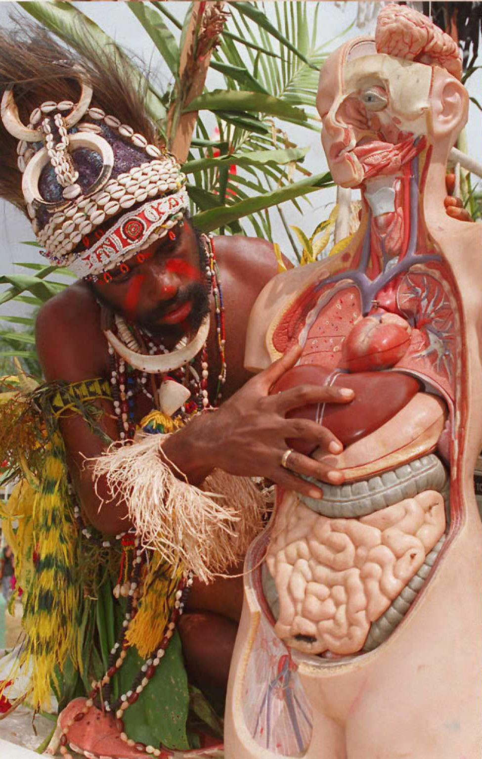 A Sepik witch doctor attempts assembling an anatom