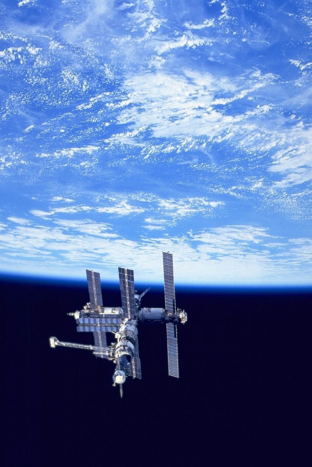 Russian Mir Space Station As Seen Alongside The Earth By The US Space Shuttle