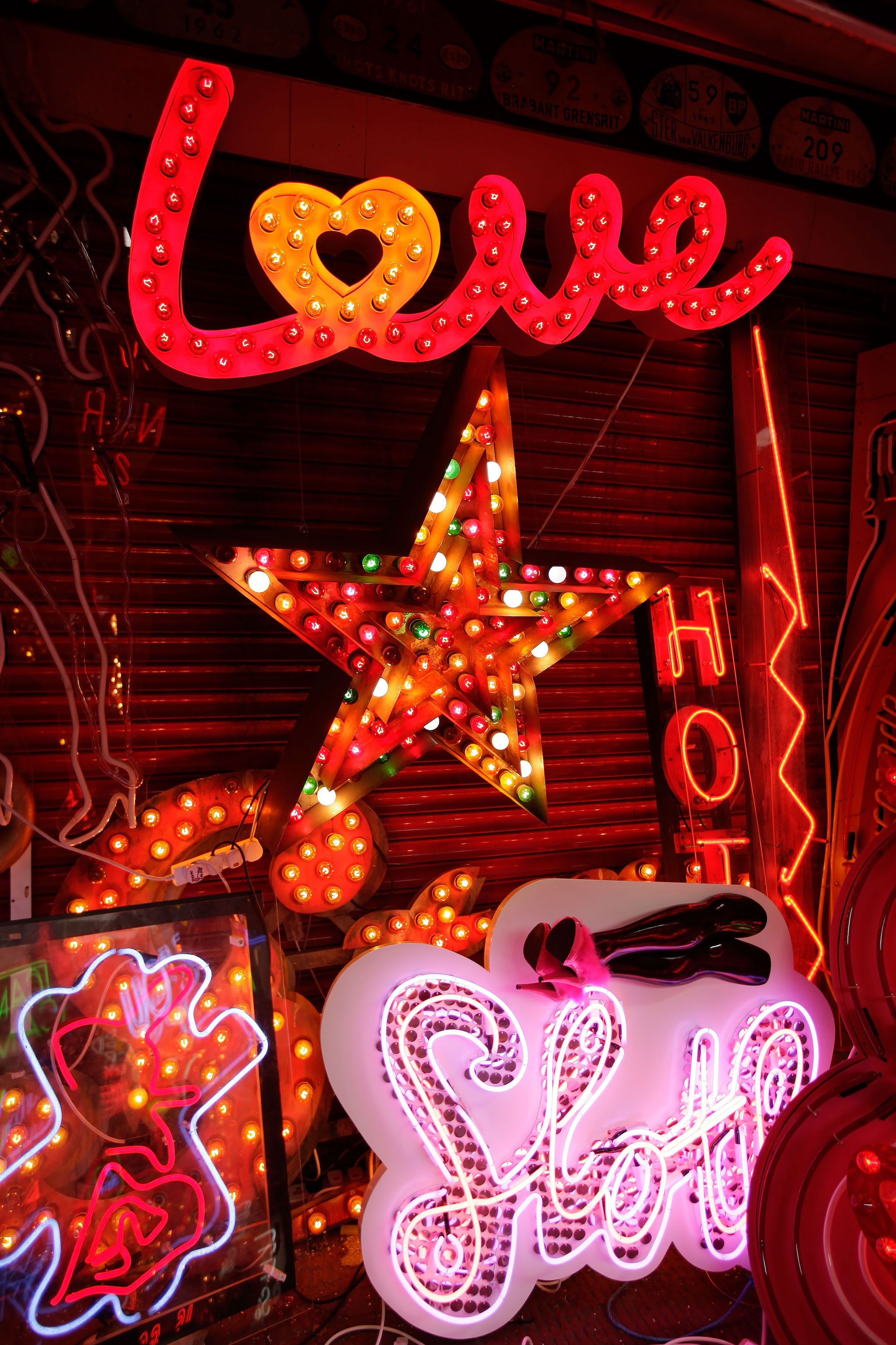 Workers Make And Renovate Neon Signs