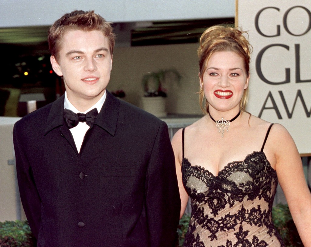 Actor Leonardo DiCaprio (L) arrives with actress a